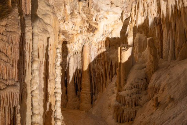 istock Stalactite and Stalagmite formations into the Frasassi Caves (Grotte di Frasassi), Marche, Ancona, Italy 1312109084