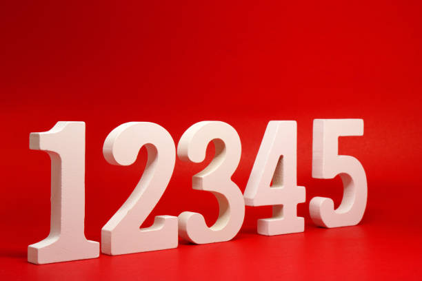 istock Counting numbers ( 1 2 3 4 5 ) white number wooden on Red Background with Copy Space - One Two Three Four Five 1312109472