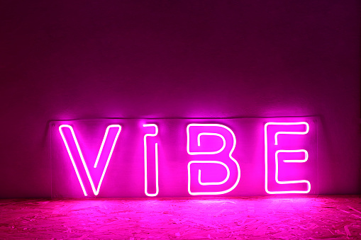 Pink neon sign vibe. Trendy style.