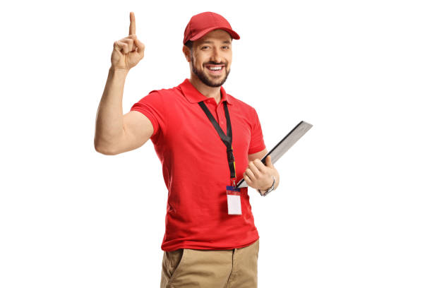 istock Male shop assistant pointing up 1312112162