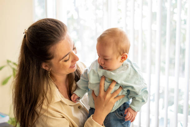 istock Mother happiness her newborn baby boy 1312113211