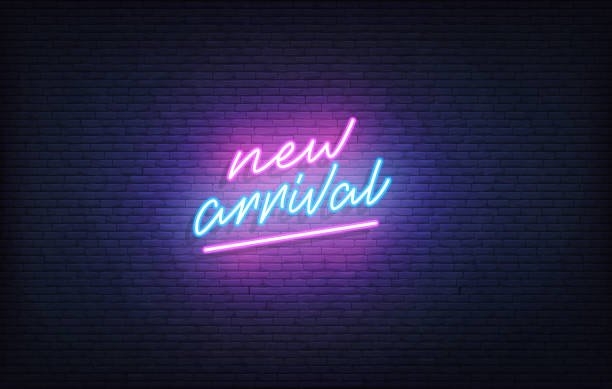 istock New Arrival neon sign. Glowing neon lettering New Arrival template. 1312113605