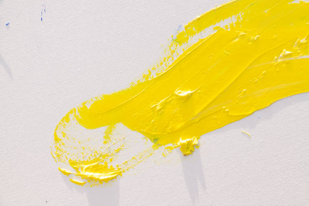 istock Oil and acrylic paint brushes on a blank canvas, Spain. 1312113714