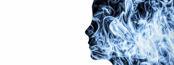 istock Composite image of smoke and face silhouette 1312117754