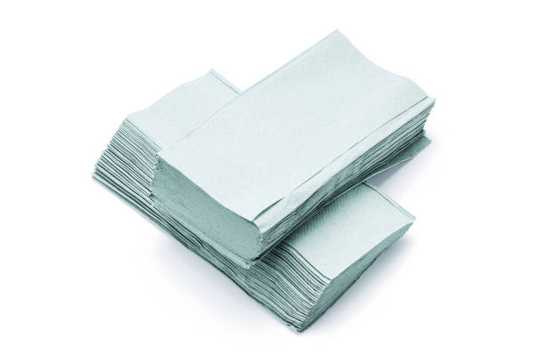 istock paper towel stack isolated on white background. disposable paper tissue for household cut out 1312117980