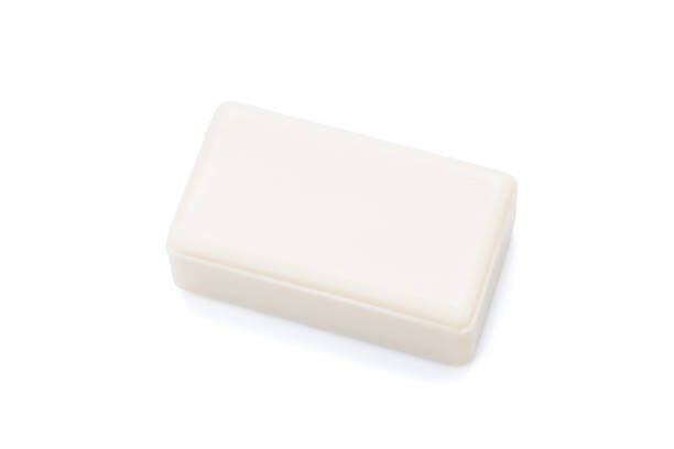 white soap bar isolated on white background. antibacterial soap brick cut out.