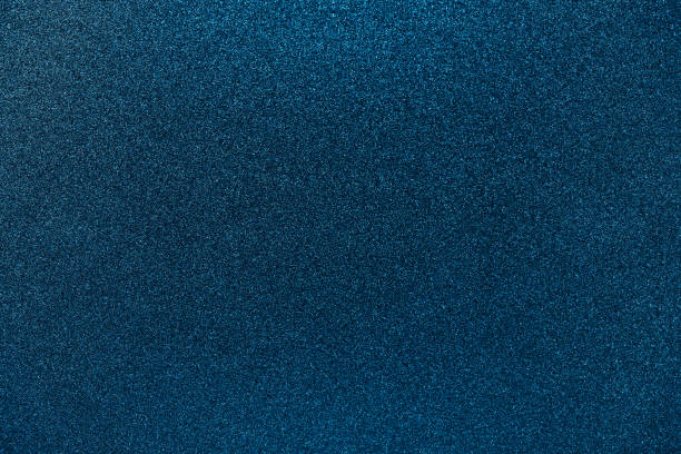 istock Dark blue rich grainy background. Sparkling foiled glitter. Abstract stock texture 1312123069
