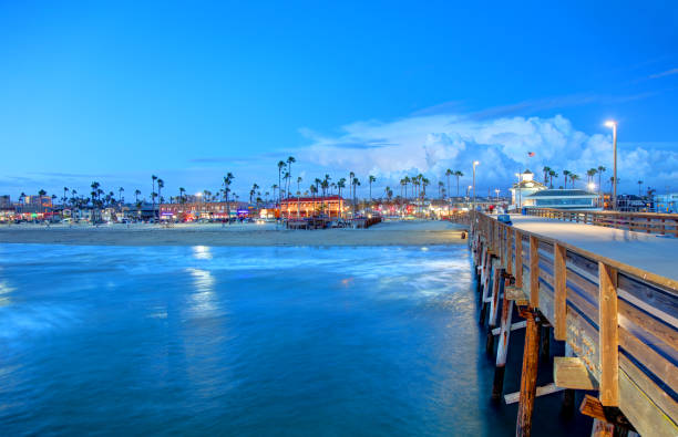 Newport Beach, California Newport Beach is a coastal city in Orange County, California, United States. Newport Beach is known for good surfing and sandy beaches newport beach california stock pictures, royalty-free photos & images