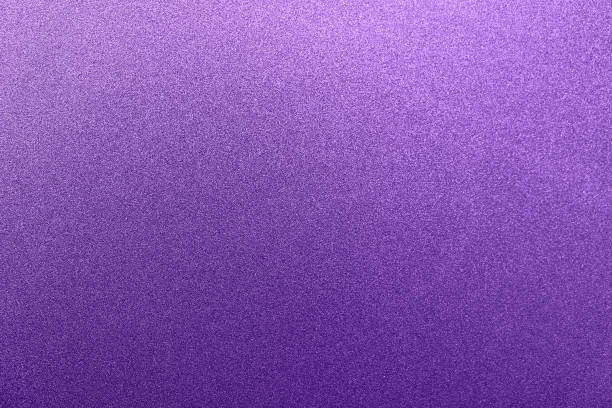 Rich magenta background color. Single-color purple texture with a small noisy glitter, highlighted on top Purple background color crystal photos stock pictures, royalty-free photos & images