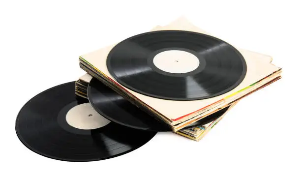 Stack of vintage vinyl records on white background