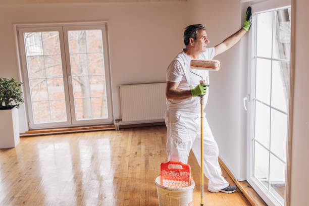 istock Male painter looking out the window 1312123926