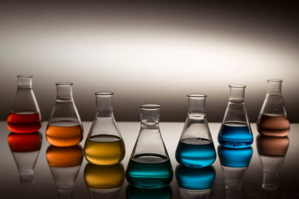 istock Scientific laboratory  flask filled with colorful liquid forming rainbow. 1312125177