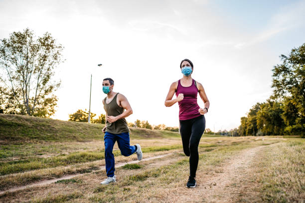 istock Couple jogging together 1312125447