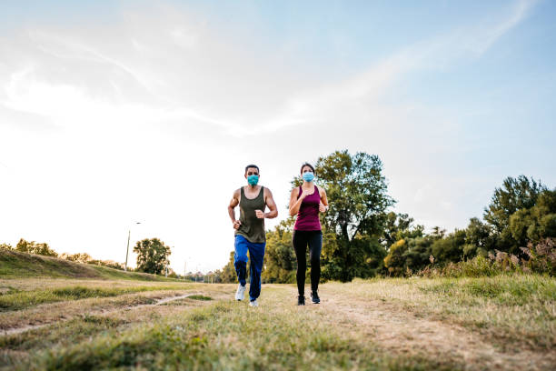 istock Couple jogging together 1312125475