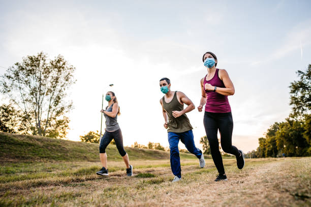 istock Friends jogging together 1312126256