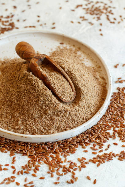 istock Raw Flax seeds flour in a plate with a spoon 1312127786