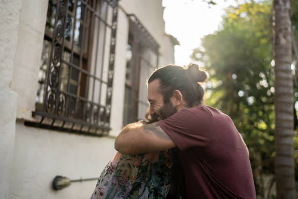 istock Couple embracing outdoors 1312131245