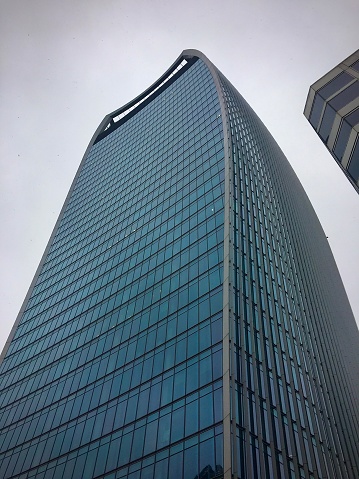 Madrid Spain. July 2, 2020. Tree and glass facade of office building