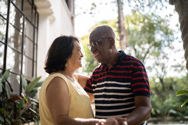 istock Senior couple dancing outdoors 1312135576