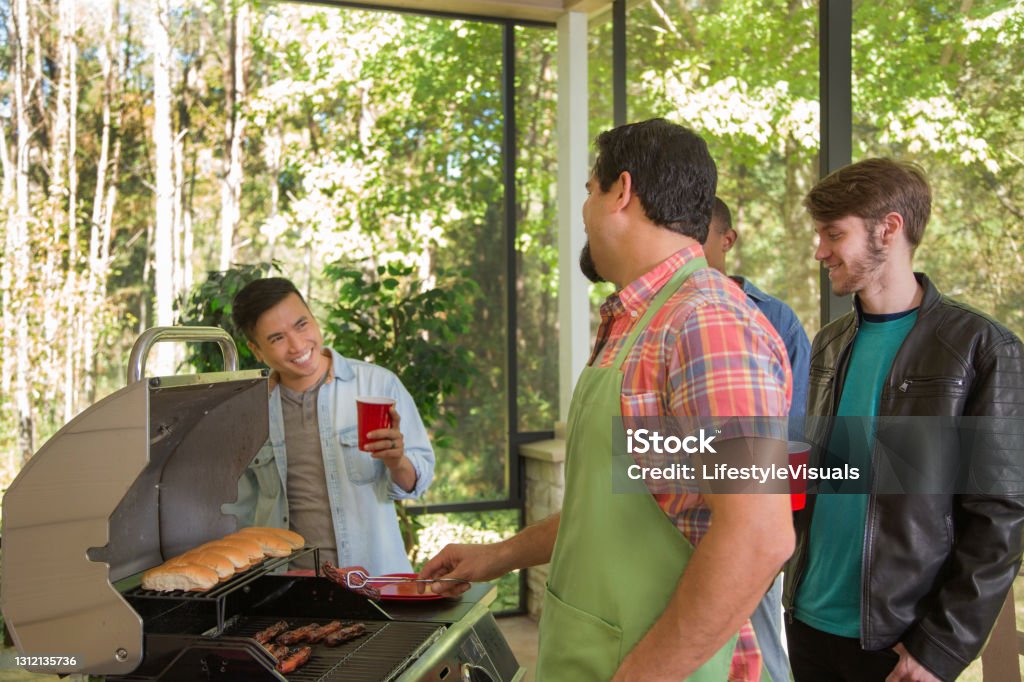 Men Cookout Multi Ethnic Group Of Young Men At A Cook Out Stock Photo - Download ...