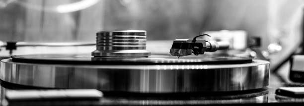 vinyl record player close up, black and white photo stock photo