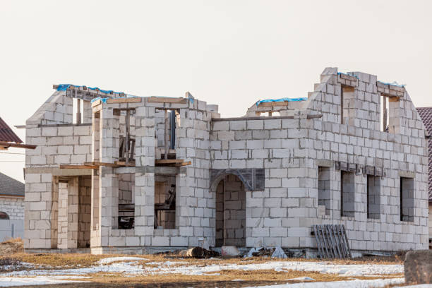 istock Abandoned unfinished empty house no windows, abandoned construction concept 1312141550