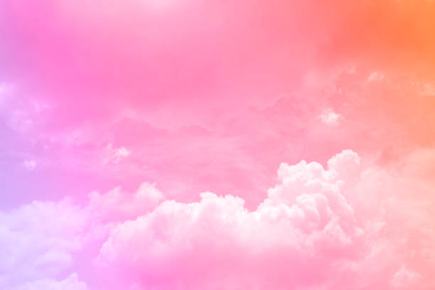istock beauty soft orange sweet pink pastel with fluffy clouds on sky. multi color image. abstract fantasy growing sweet light 1312141913