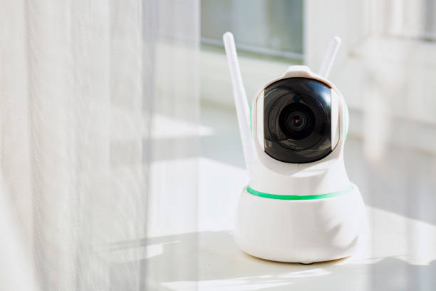 istock CCTV camera for home. 360 degree rotation, object tracking. Home security, babysitting and pets. Protection from robbers. 1312146482