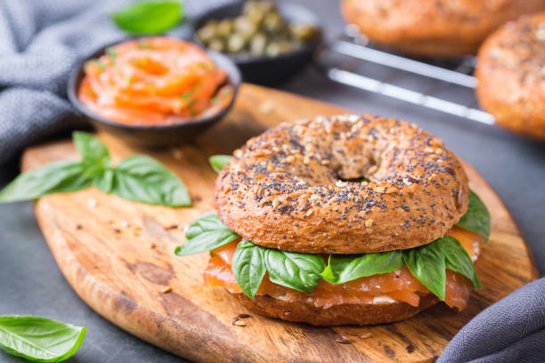 istock Bagels with cream cheese and salmon. Plating, fast lunch, meal. 1312149688