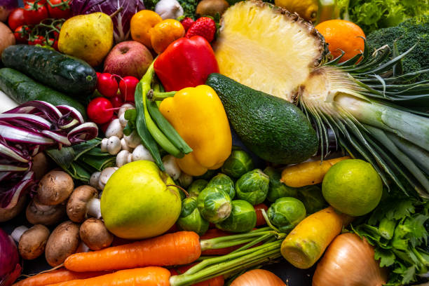 istock Multi-colored vegetable and fruit arrangement. Fresh and tasty ingredients. 1312150472