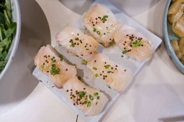 istock ripened kimchi on top of sushi made of white fish. 1312150802