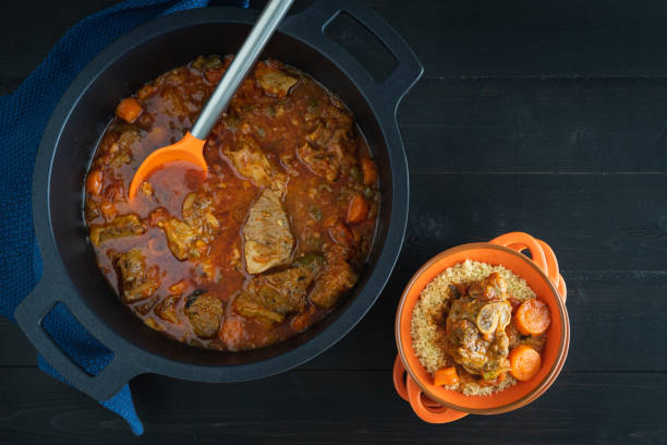 istock Lamb stew with vegetables and couscous on a black background. Ramadan concept. 1312151202