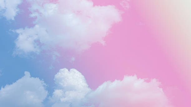 istock beauty soft yellow sweet pastel with fluffy clouds on sky. multi color rainbow image. abstract fantasy growing sweet light 1312152237