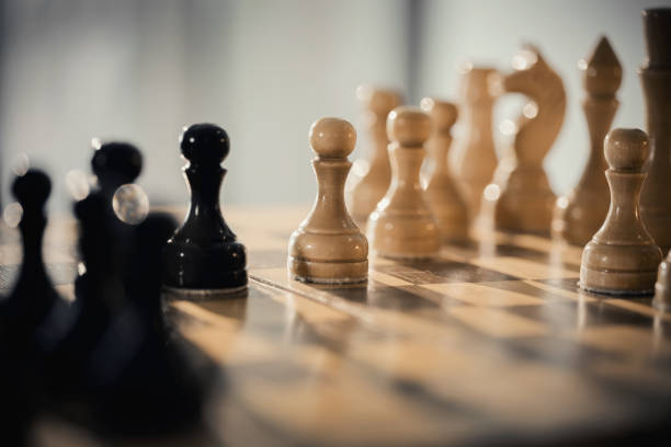 istock Wooden chess pieces on the chessboard. 1312152531