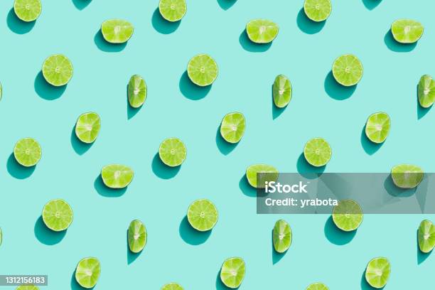 Summer Fruits Top View Bright Juice Citrus Green Lime On Blue Background Healthy Fruit Food Stock Photo - Download Image Now