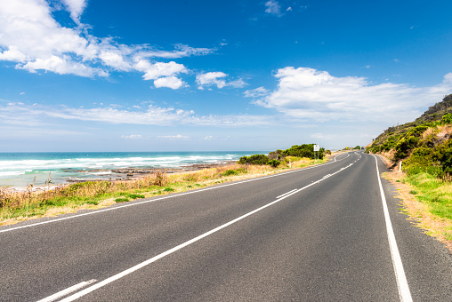 A curving section of the famous Great Ocean Road in Victoria State. It is one of Australia's best loved driving routes.