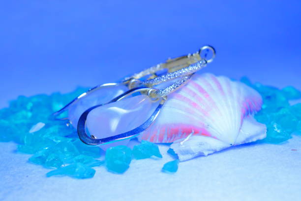 istock Summery accessories and seashells (blue background) 1312156594