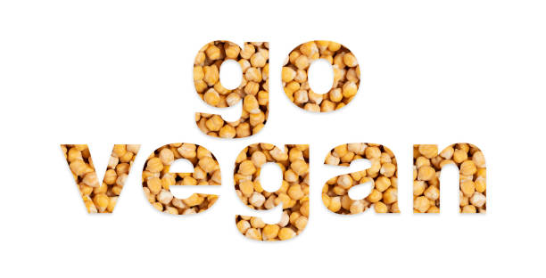 istock Lettering go vegan from raw high protein chickpeas on light background 1312157808