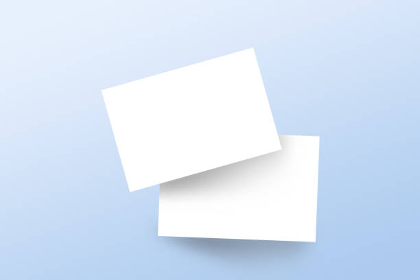 istock Realistic mockup branding business cards template with shadow on light blue background. Flat lay, top view. 1312164023