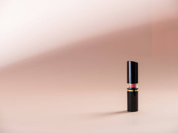 istock Closed lipstick on a powdery background. Side view. 1312164031