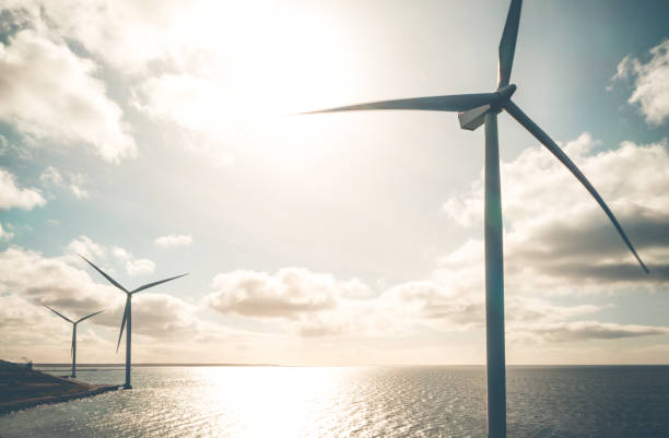 istock Wind turbines in the ocean 1312167440