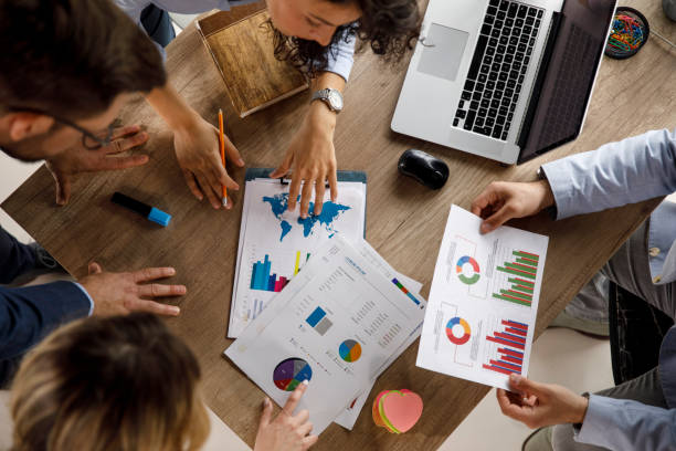 istock Entrepreneurs discussing ideas and reviewing documents during a business meeting 1312169453