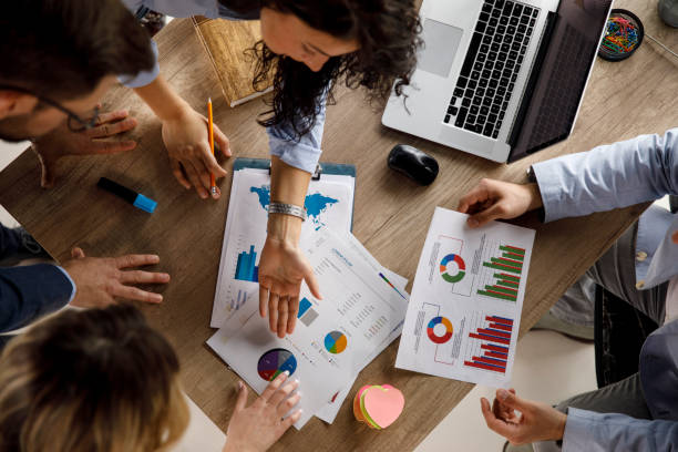 istock Suggesting ideas while reviewing documents during a business meeting 1312169504