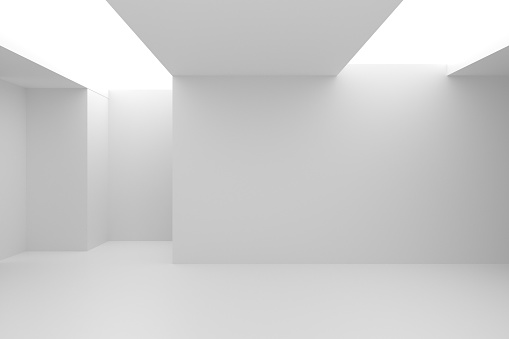 Empty room with lighting from ceiling.