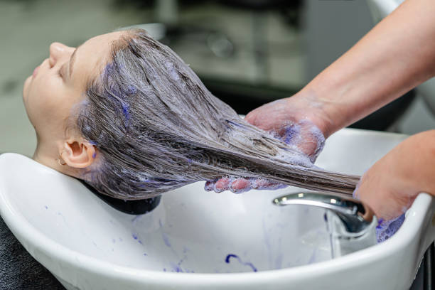 istock Purple shampoo after hair bleaching. 1312176255
