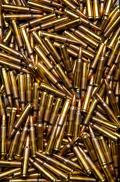 istock Ammunition for modern weapons. Background from cartridges for a carbine. 1312177456