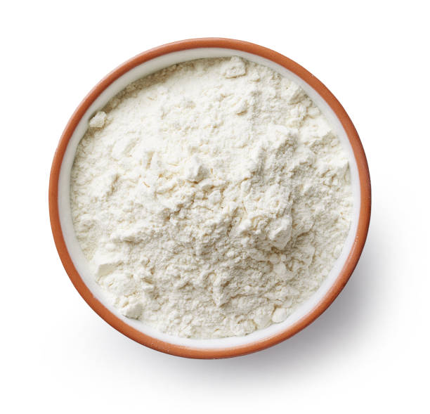 istock bowl of flour isolated on white 1312177516