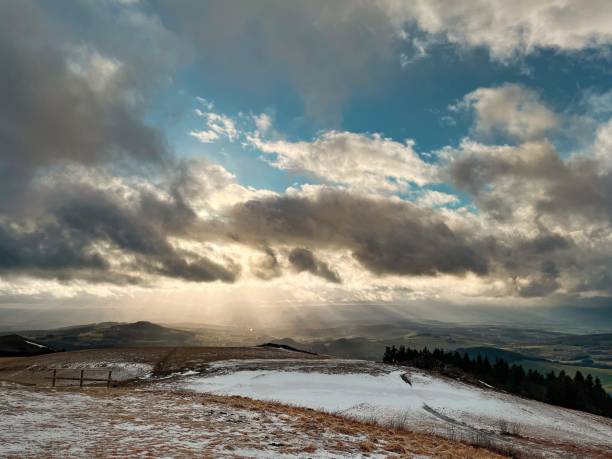 istock The sun's rays cut through the overhanging clouds 1312178337