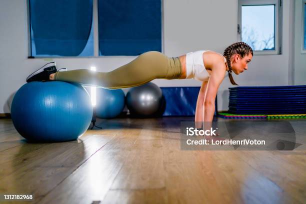 Fit Woman Workout With Fitness Ball Stock Photo - Download Image Now - Fitness Ball, Push-ups, Exercising