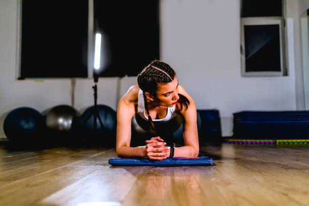istock Fit woman in plank position 1312183705